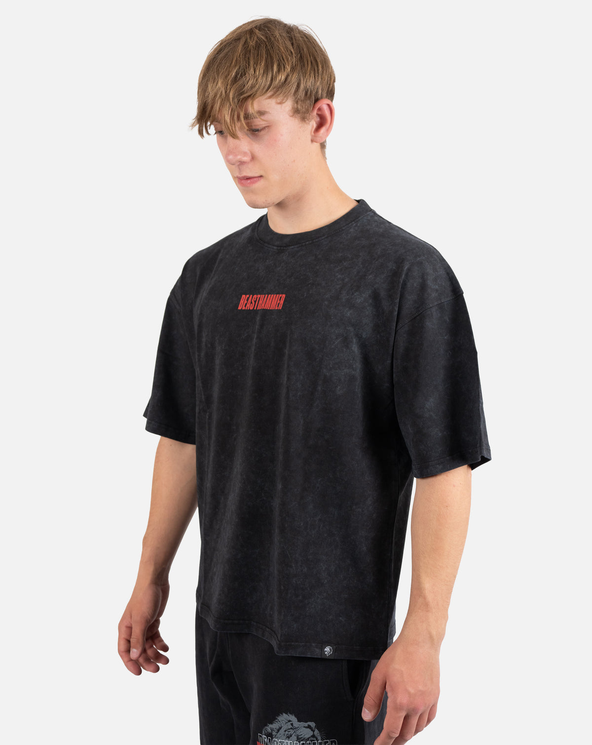 BEASTHAMMER Embrace Discipline oversized tee in faded black, worn front view