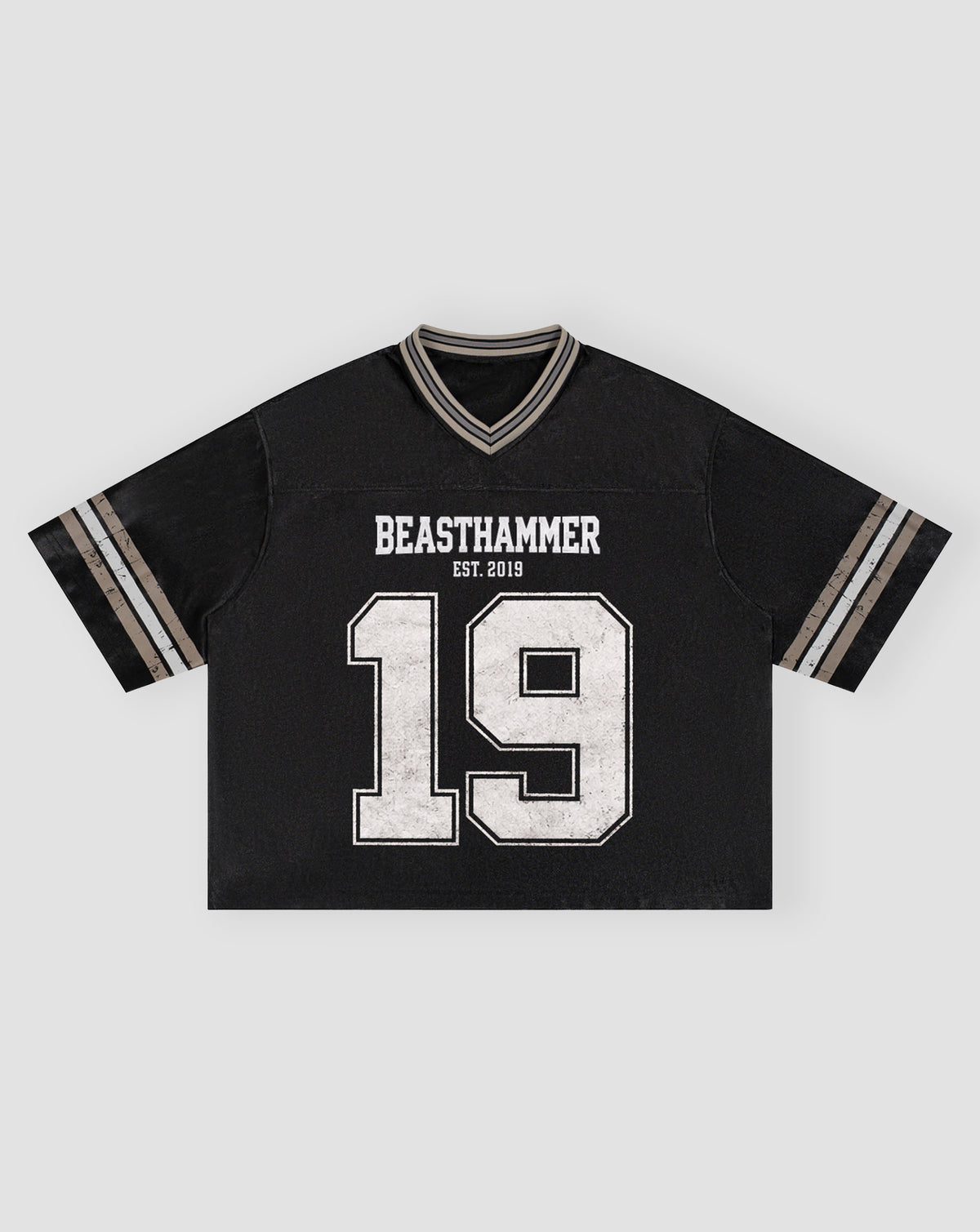 BEASTHAMMER Varsity 19 Jersey in black laid flat, front view with BEASTHAMMER, EST. 2019 and a distressed white 19, boxy cropped fit and striped sleeve tipping