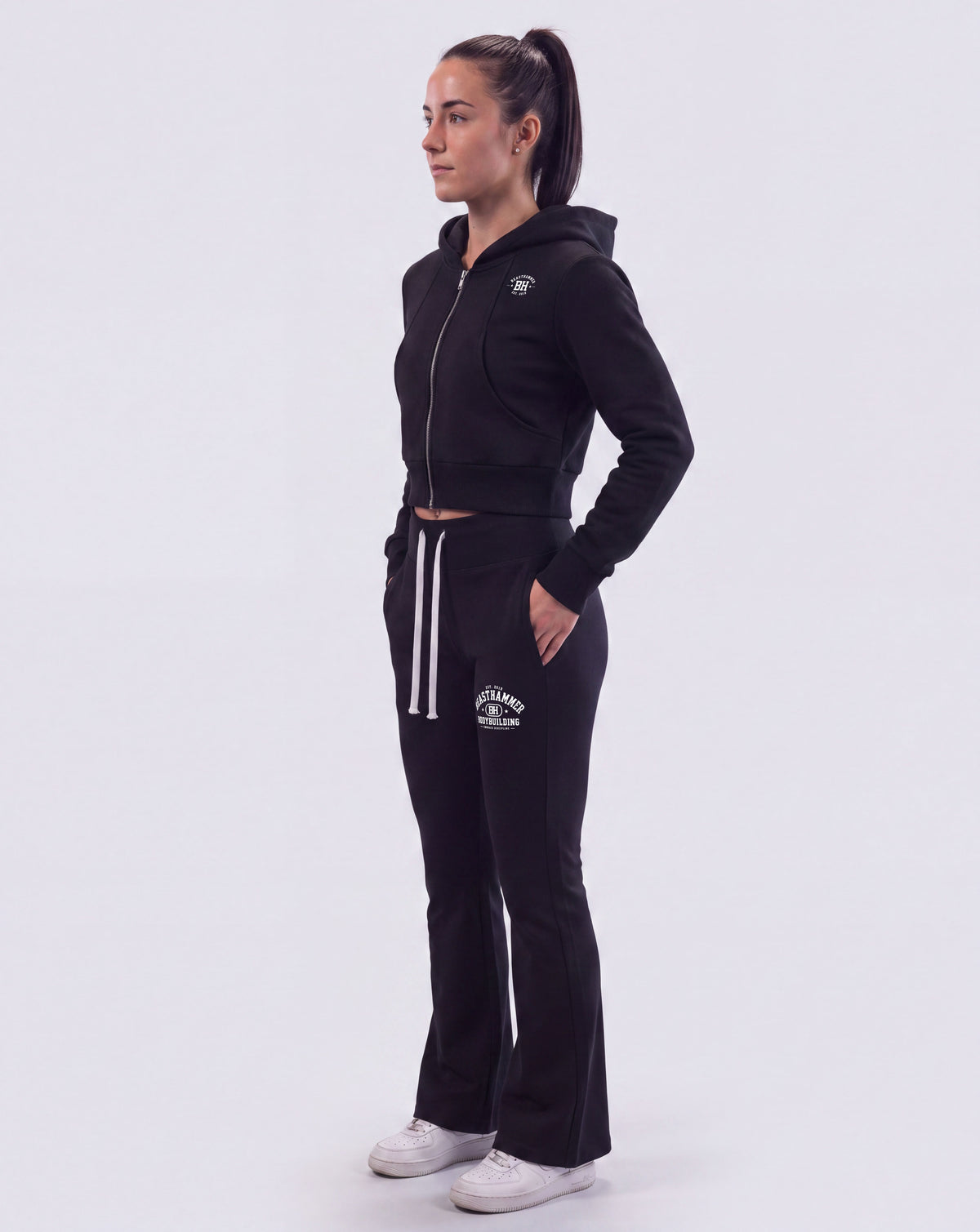BEASTHAMMER Rest flare pants in black with matching crop zip hoodie, worn view