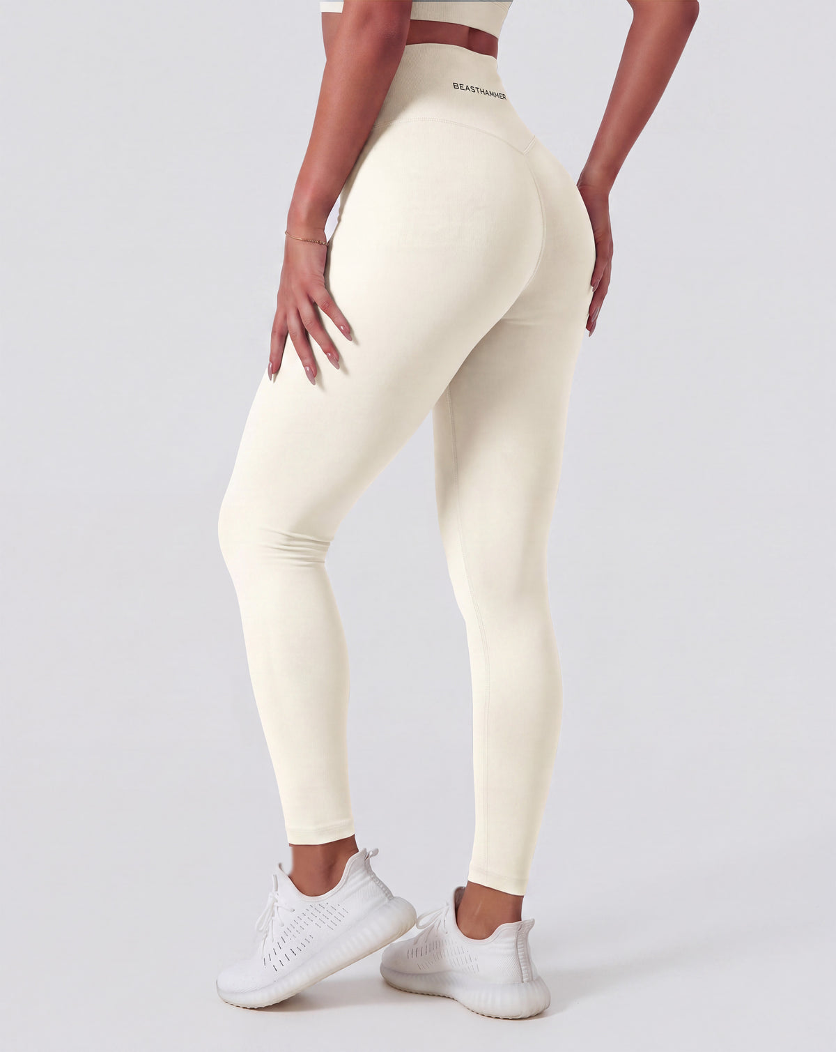 BEASTHAMMER Form high rise leggings in beige, worn back view