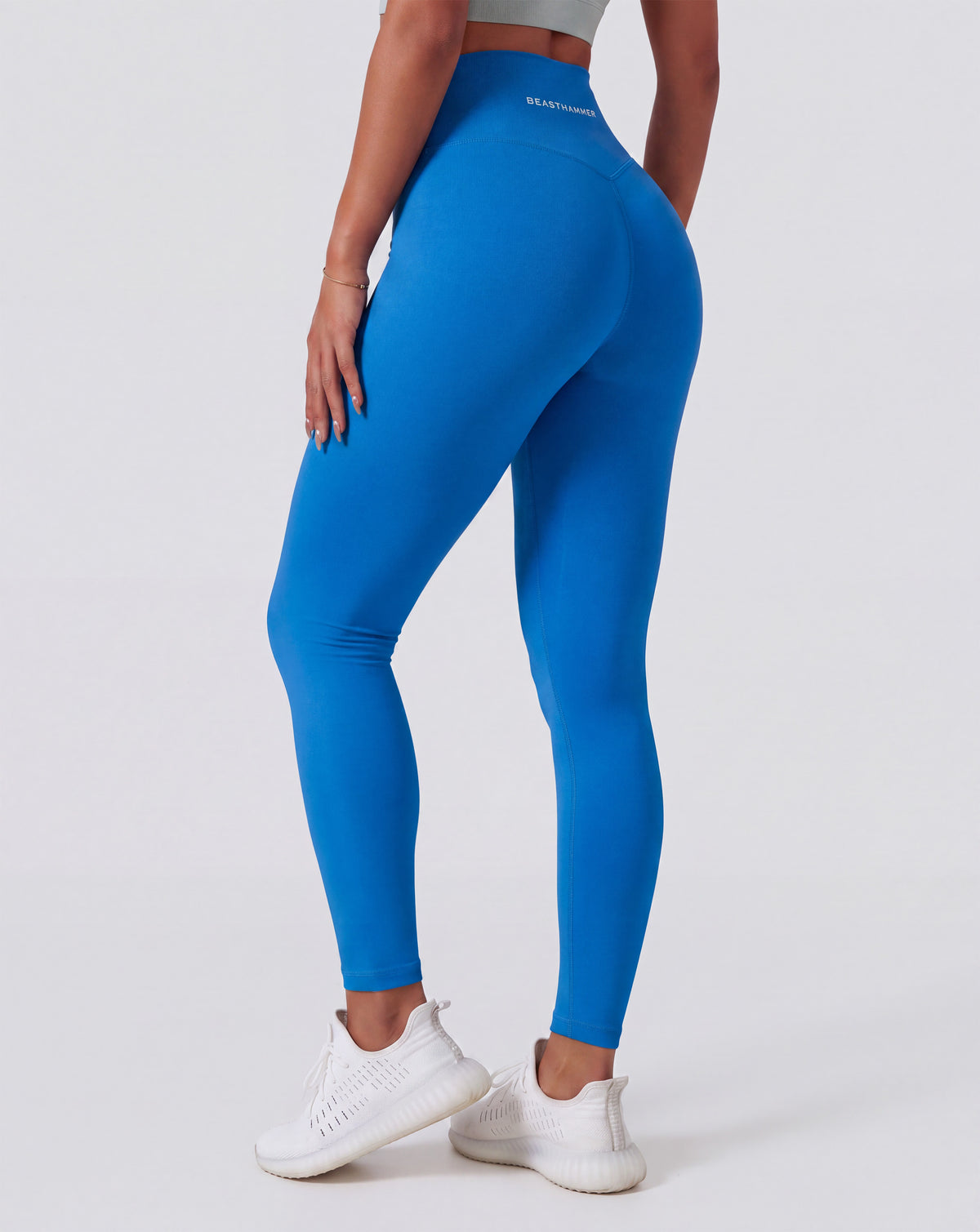 BEASTHAMMER Form high rise leggings in deep blue, worn back view