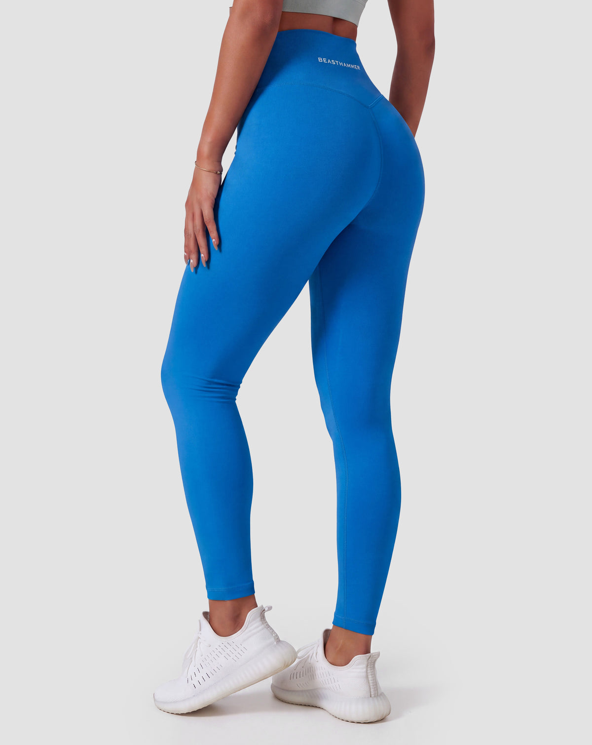 BEASTHAMMER Form high rise leggings in deep blue, worn back view