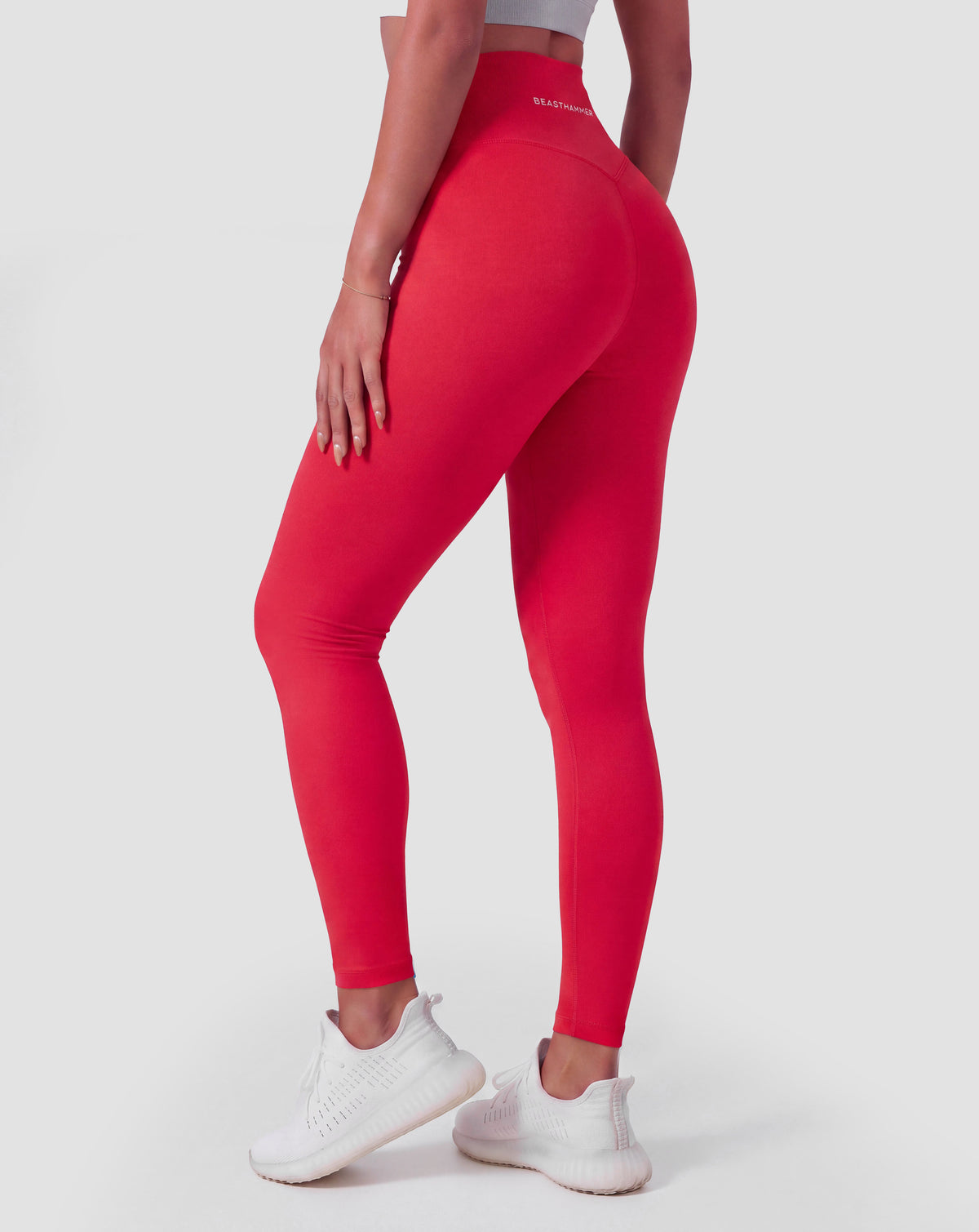 BEASTHAMMER Form high rise leggings in red, worn back view
