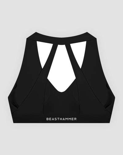 BEASTHAMMER Flow halter bra in black, flat lay back view