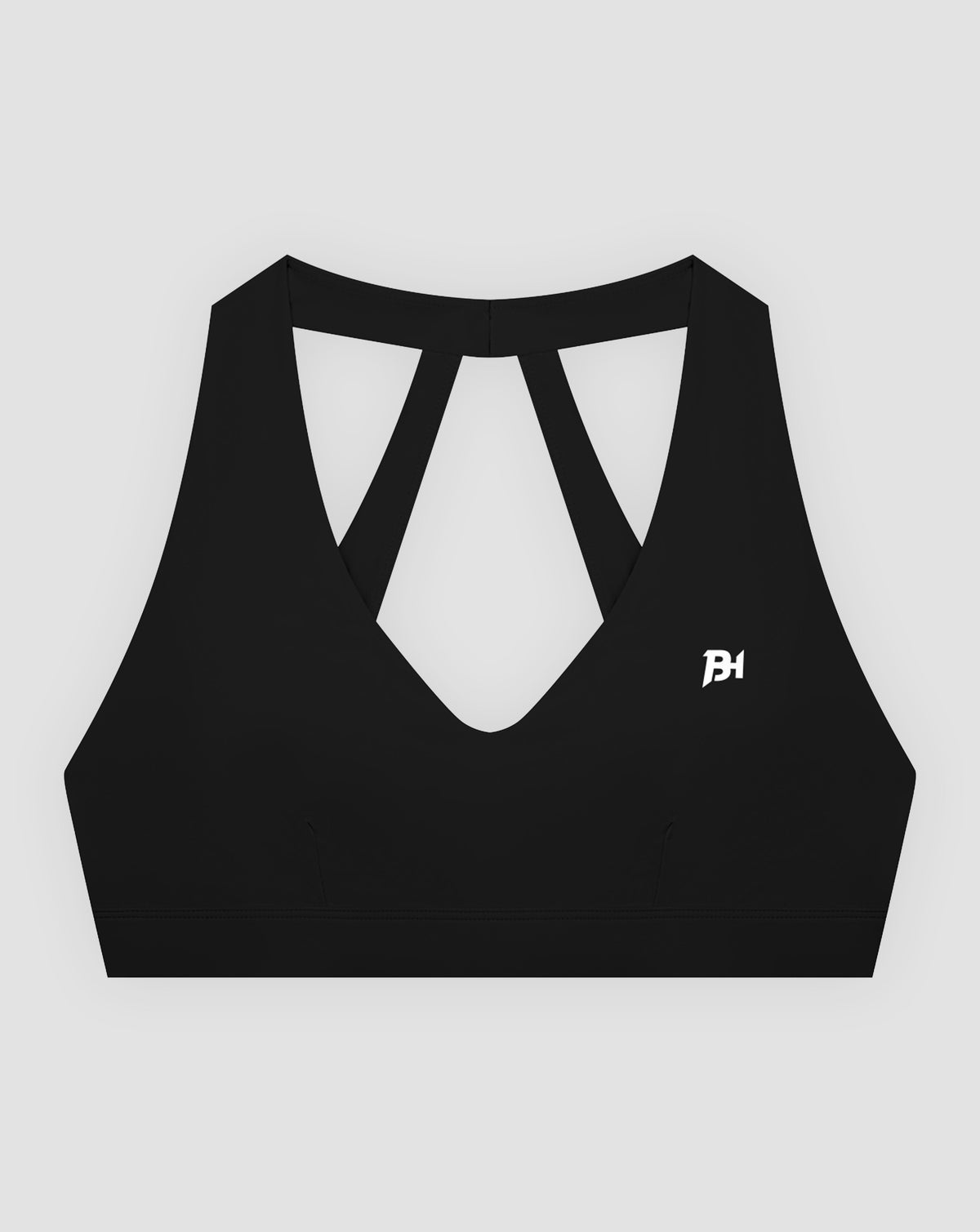BEASTHAMMER Flow halter bra in black, flat lay front view