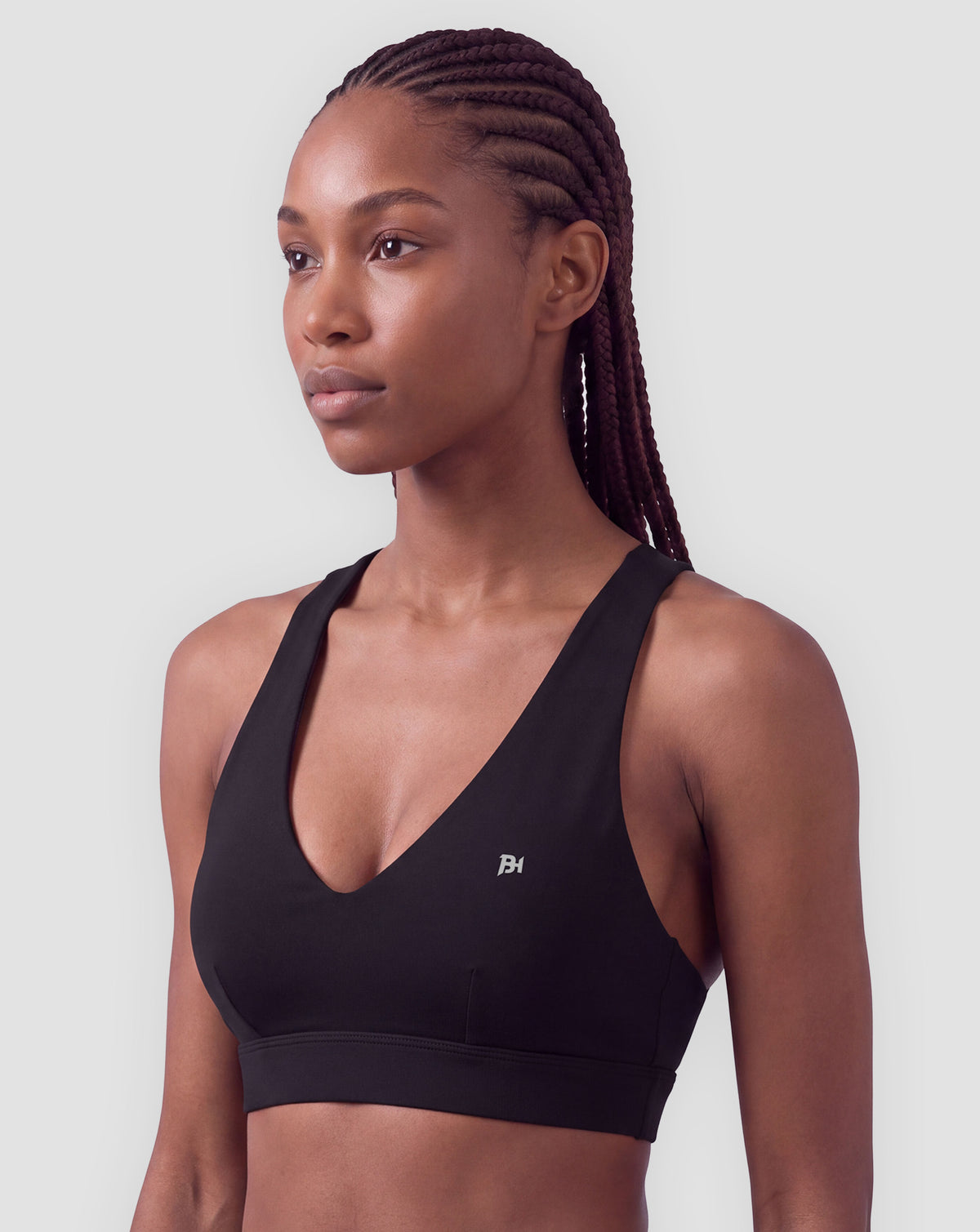 BEASTHAMMER Flow halter bra in black, worn front view