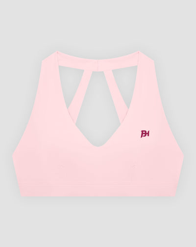 BEASTHAMMER Flow halter bra in pink, flat lay front view