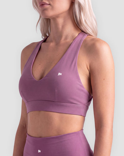 BEASTHAMMER Flow halter bra in plum purple, worn front view