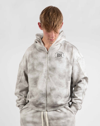 BEASTHAMMER Formed by Discipline zip hoodie in faded grey, worn front view
