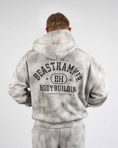 BEASTHAMMER Formed by Discipline zip hoodie in faded grey, worn back view