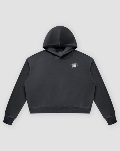 BEASTHAMMER Rest washed boxy hoodie in black, flat front view with the hood and BH chest badge