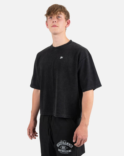 BEASTHAMMER Waffle boxy t-shirt in washed black, worn front view with BH chest logo