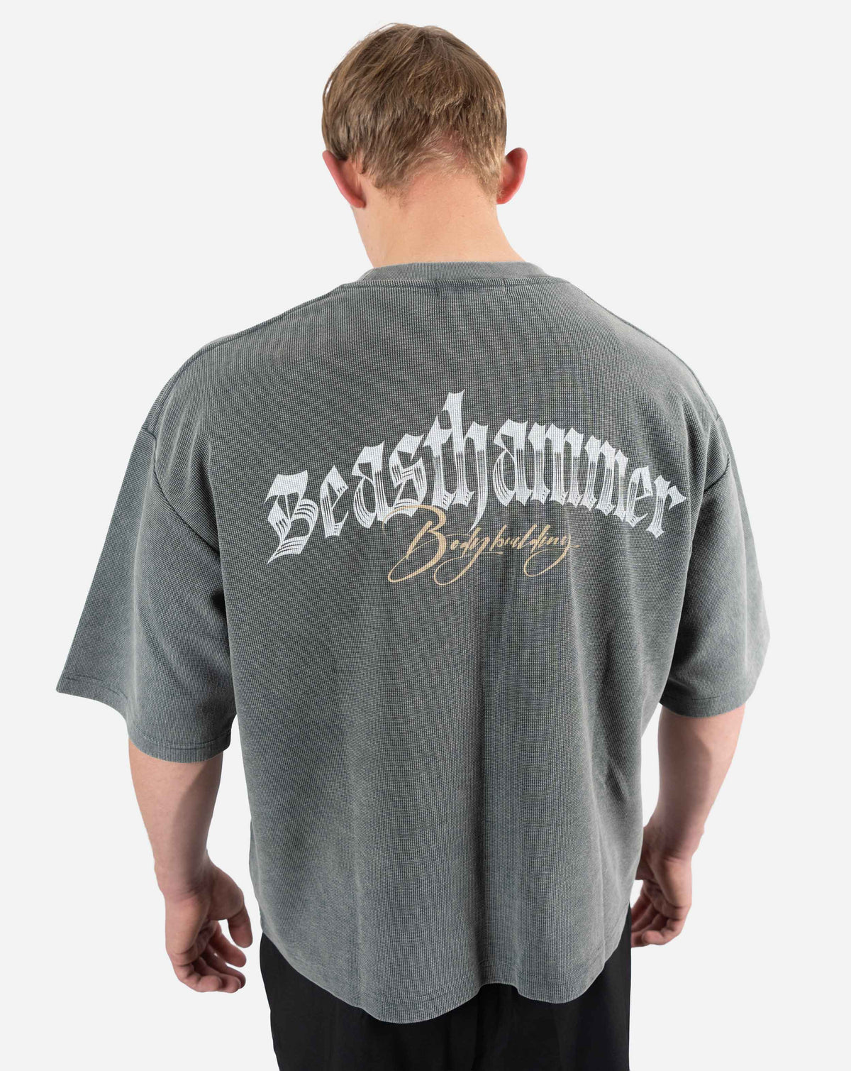 BEASTHAMMER Waffle boxy t-shirt in washed grey, worn back view with the Beasthammer script print