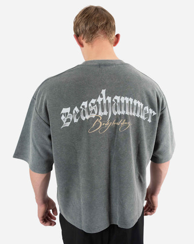 BEASTHAMMER Waffle boxy t-shirt in washed grey, worn back view with the Beasthammer script print