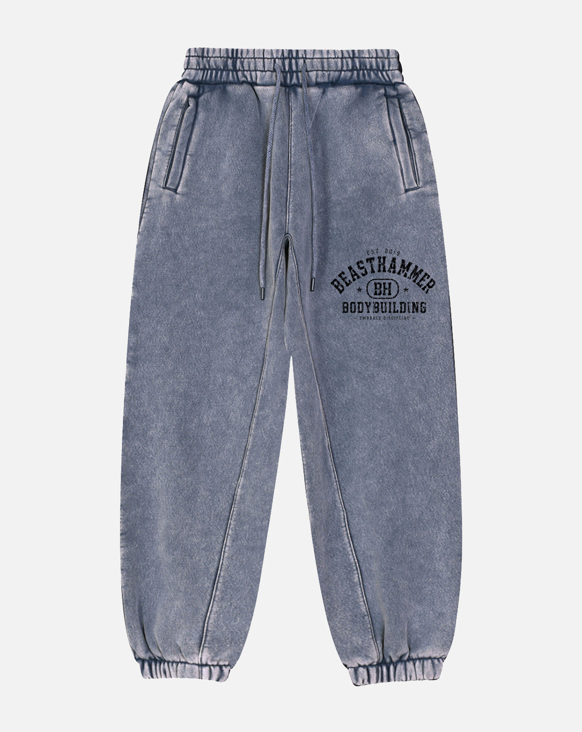 BEASTHAMMER Snow Wash cuffed joggers in washed blue, flat front view with the arched BEASTHAMMER print on the thigh