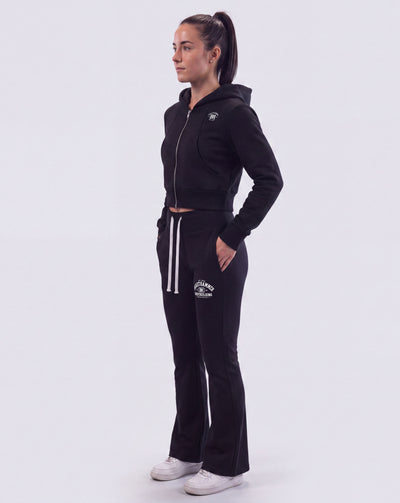 BEASTHAMMER Rest flare pants in black with matching crop zip hoodie, worn view