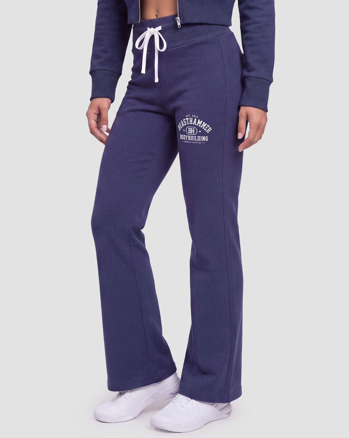 BEASTHAMMER Rest flare pants in black, worn side view