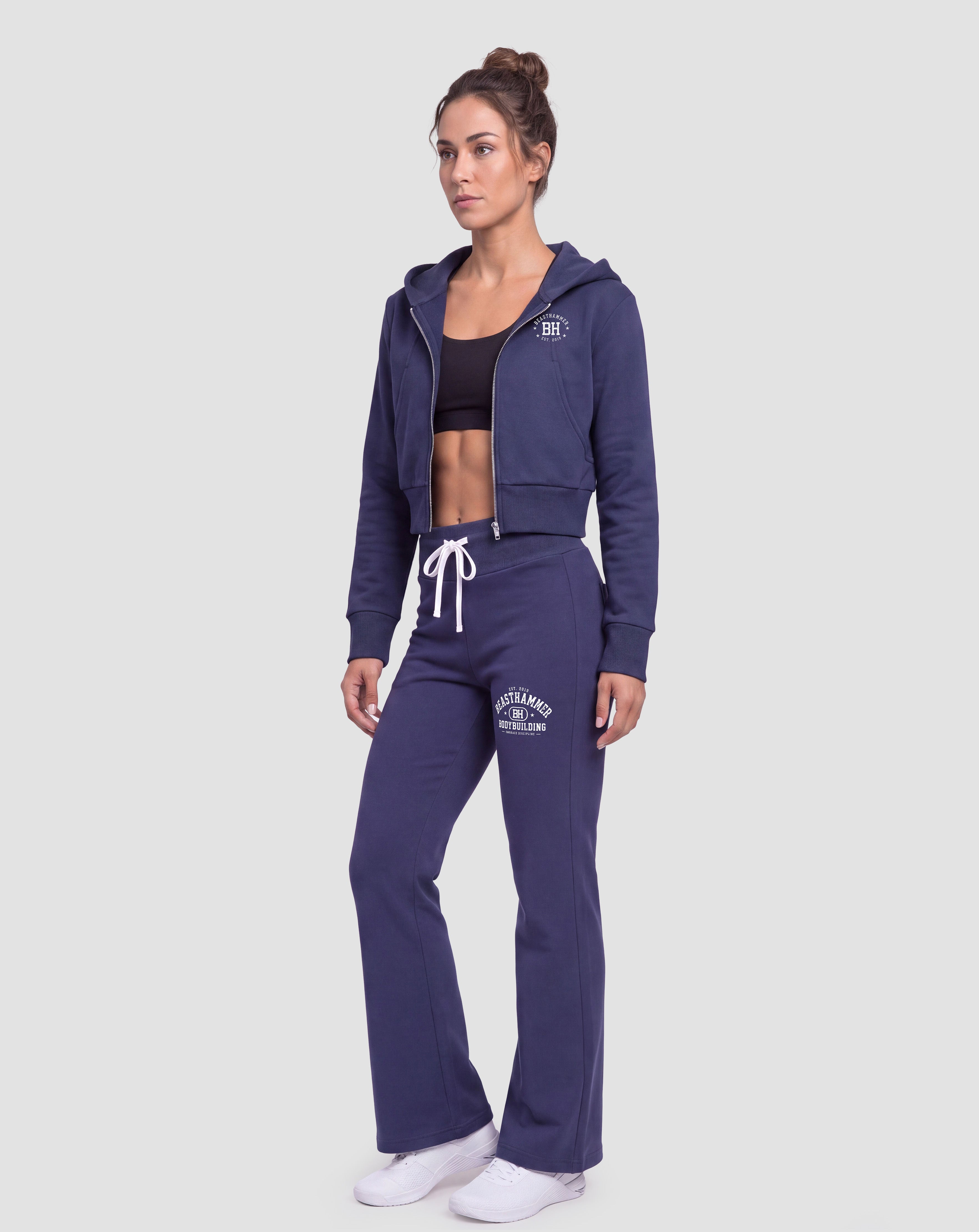 BEASTHAMMER Rest flare pants in black, worn front view showing flared hem