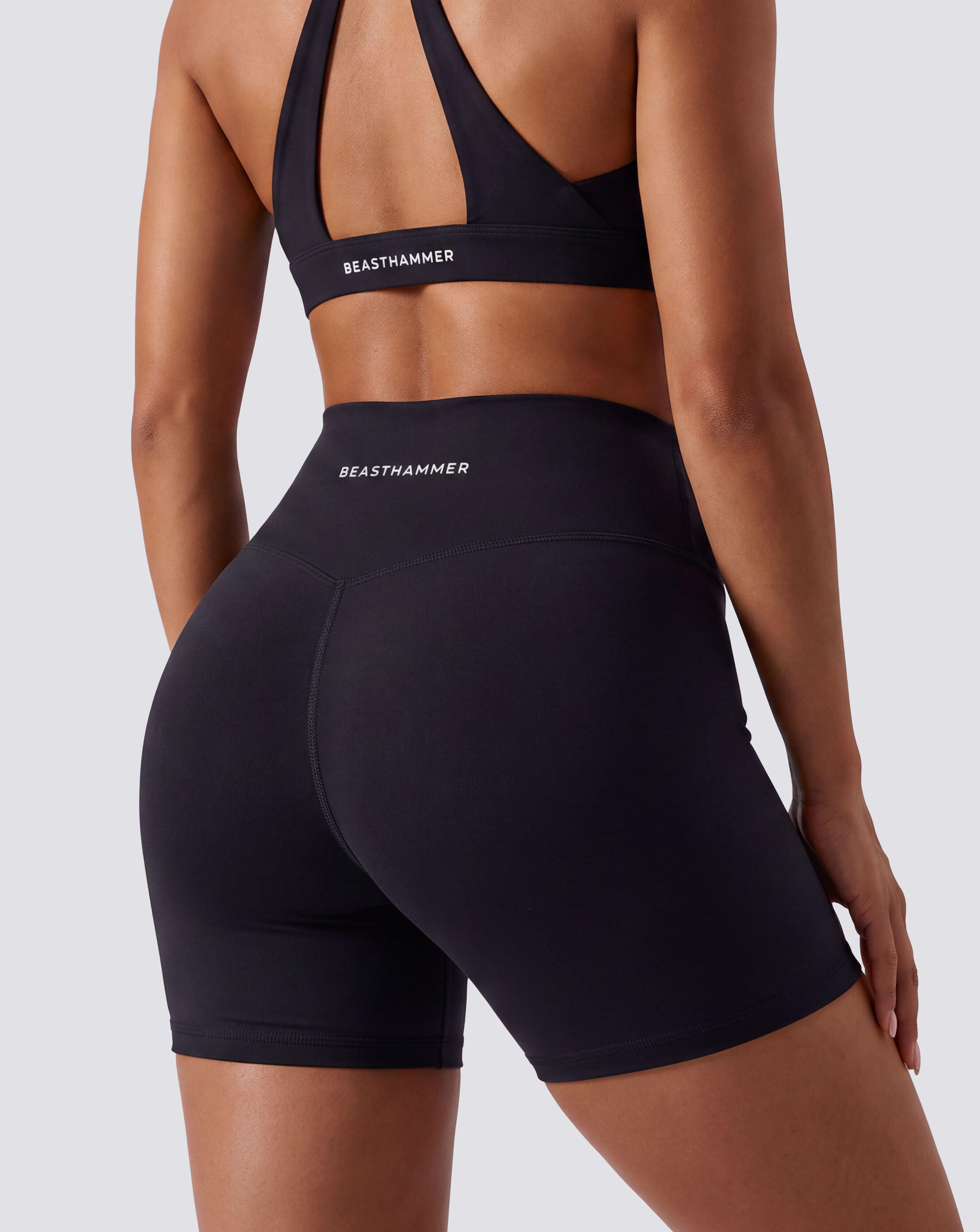 BEASTHAMMER Form high rise shorts in black, worn back view