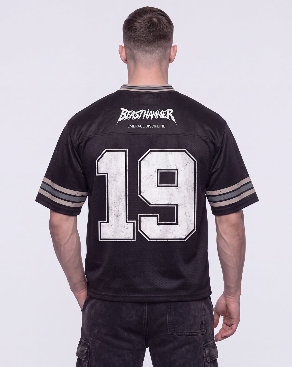 BEASTHAMMER Varsity 19 jersey, back view with EMBRACE DISCIPLINE print