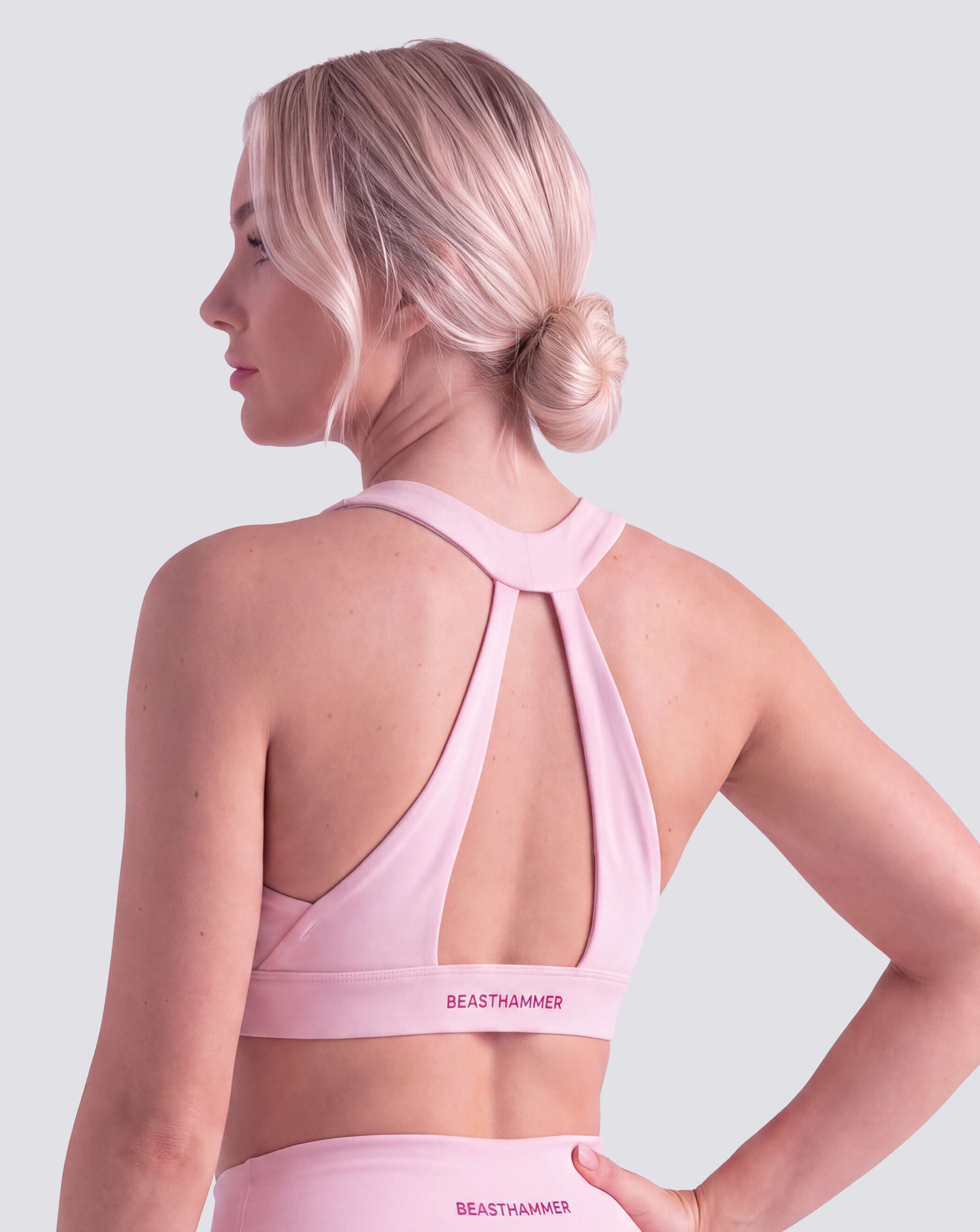 BEASTHAMMER Flow halter bra in pink, worn back view