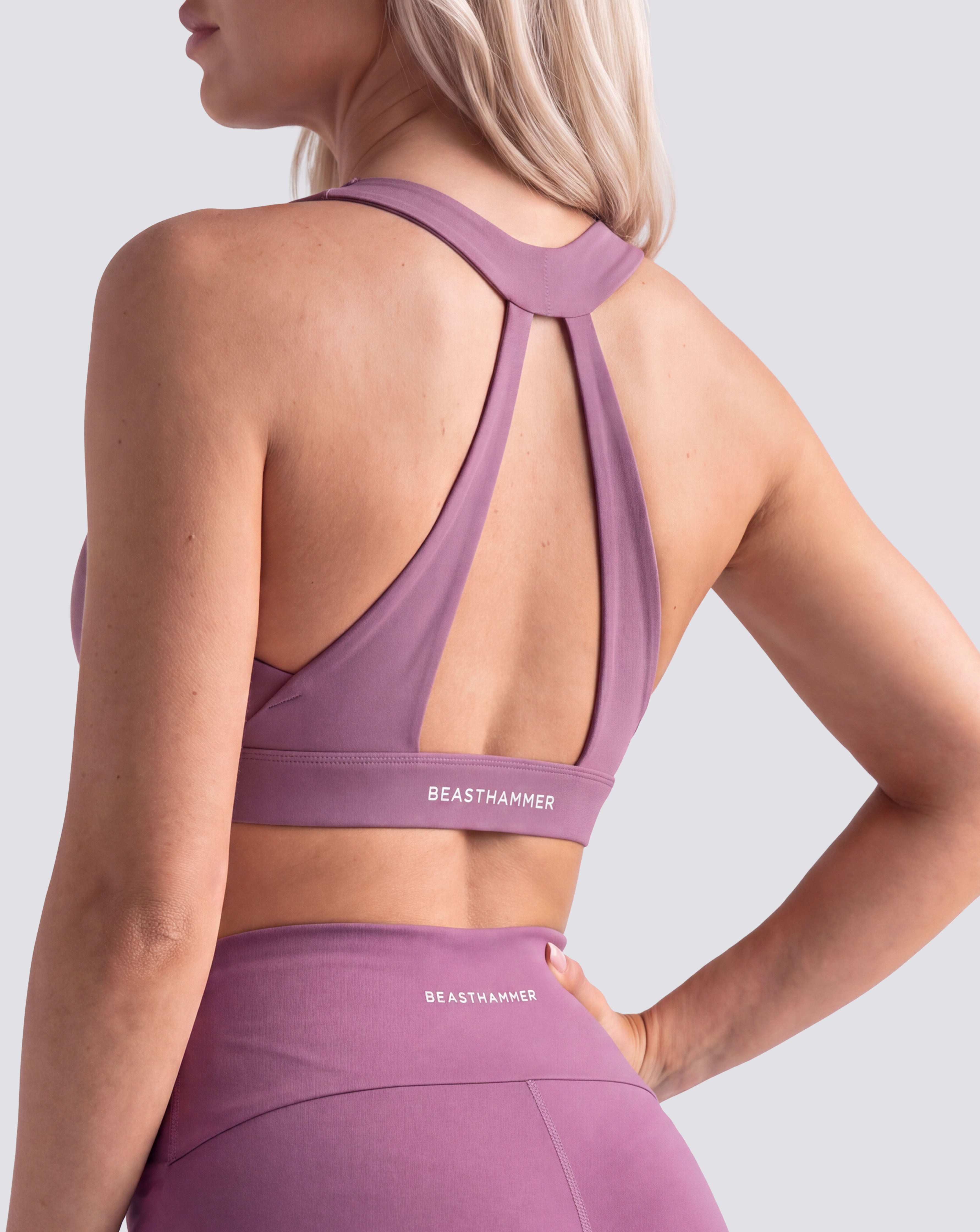 BEASTHAMMER Flow halter bra in deep purple, worn back view