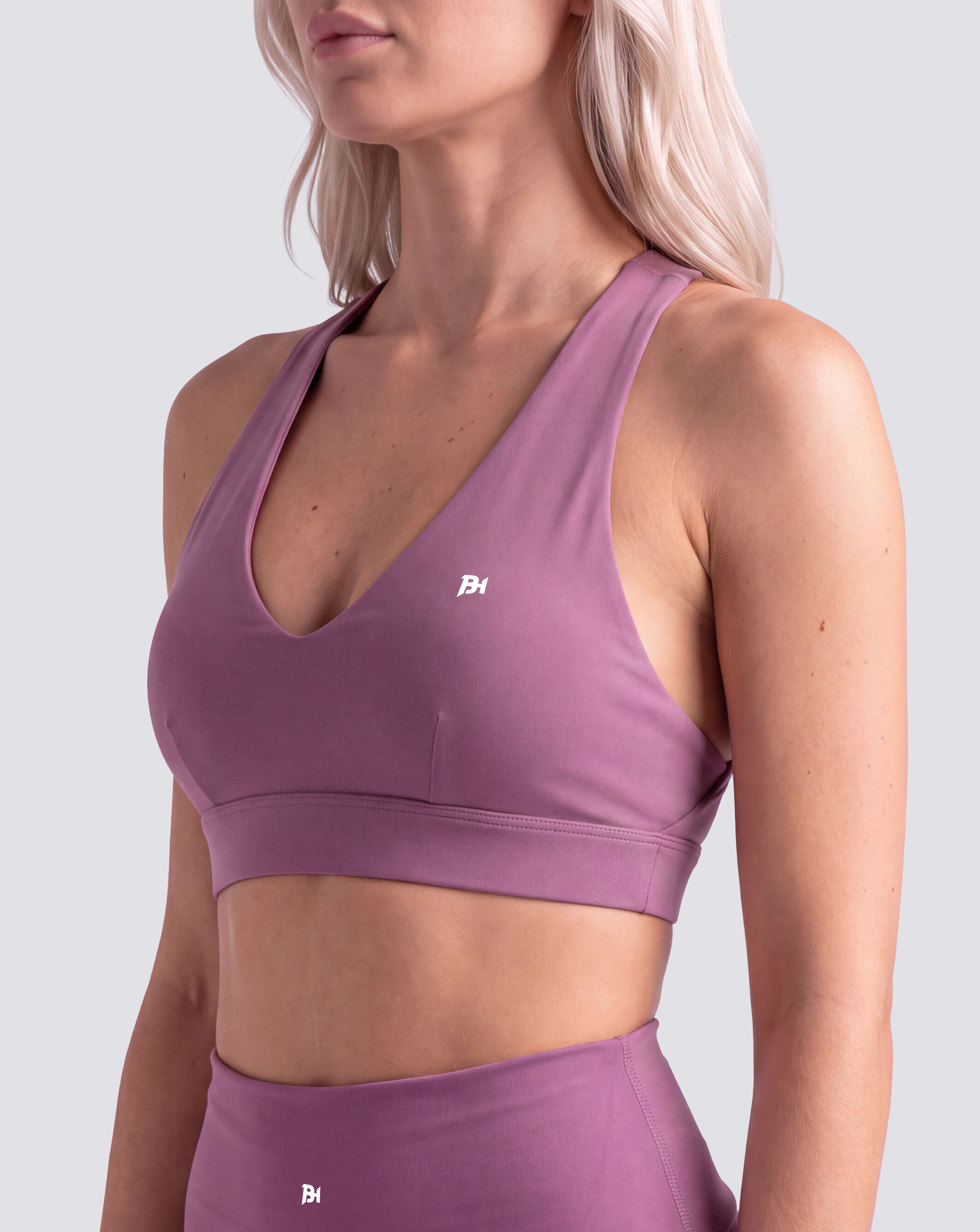 BEASTHAMMER Flow halter bra in deep purple, worn front view