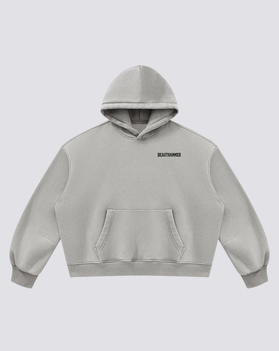 BEASTHAMMER Vintage Wash boxy hoodie in washed grey, front view with small chest logo and kangaroo pocket