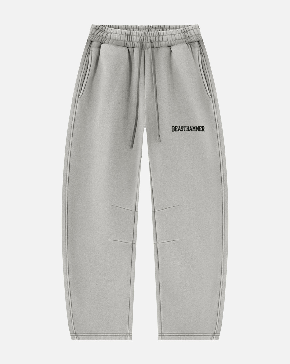 BEASTHAMMER Vintage Wash barrel leg joggers in washed grey, front view with logo on the thigh
