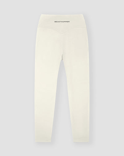 BEASTHAMMER Form high rise leggings in beige, flat back view with the BEASTHAMMER wordmark on the waistband and a V-shaped back yoke