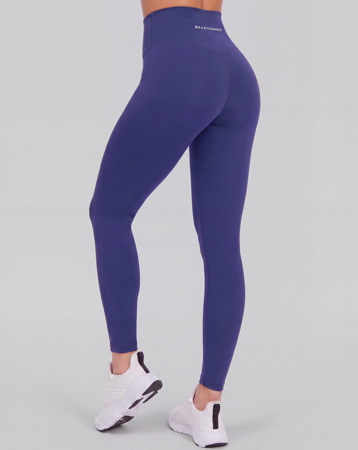 BEASTHAMMER Form high rise leggings in dark blue, worn back view