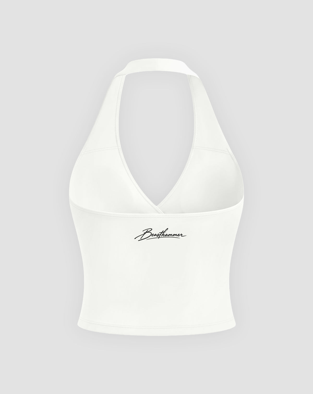 BEASTHAMMER Signature halter top in white, flat back view with the handwritten Beasthammer script logo