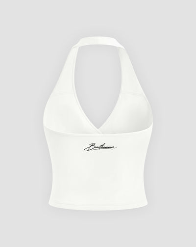 BEASTHAMMER Signature halter top in white, flat back view with the handwritten Beasthammer script logo