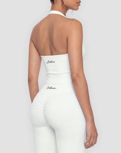 BEASTHAMMER Signature halter top in white, worn back three-quarter view with the handwritten Beasthammer script logo