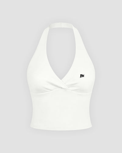 BEASTHAMMER Signature halter top in white, flat front view showing the halter neck, ruched twist and BH monogram