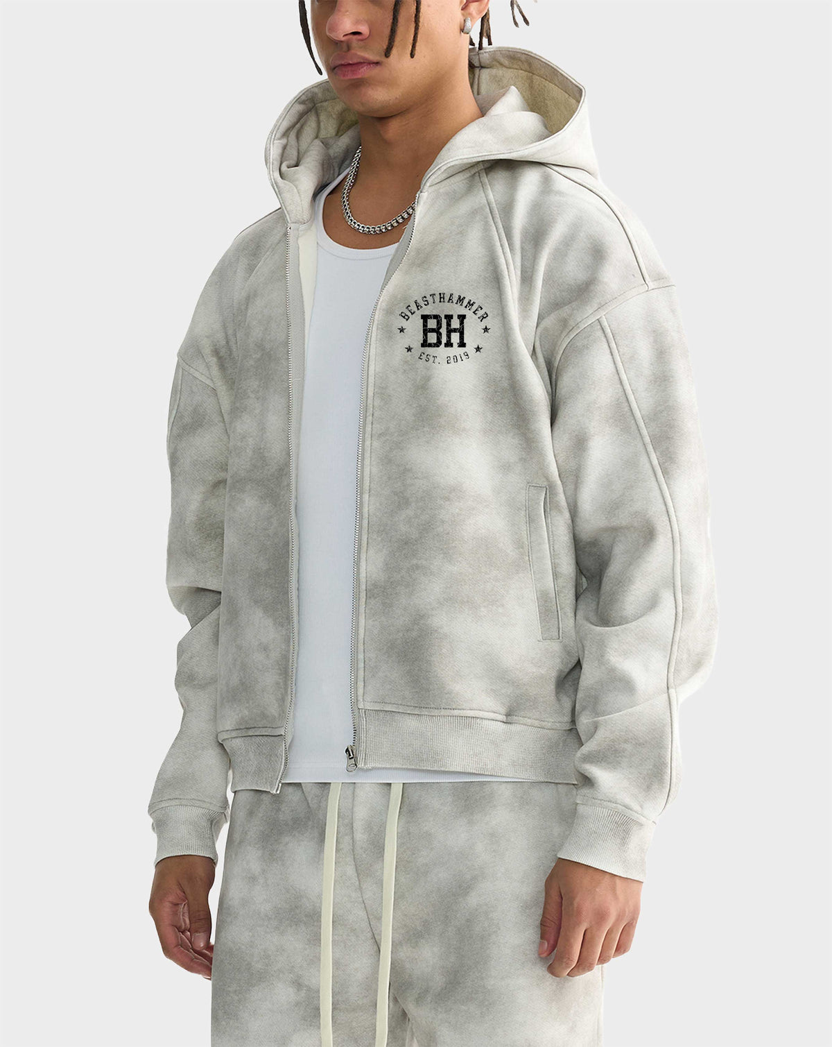 BEASTHAMMER Formed by Discipline zip hoodie in faded grey, worn front view