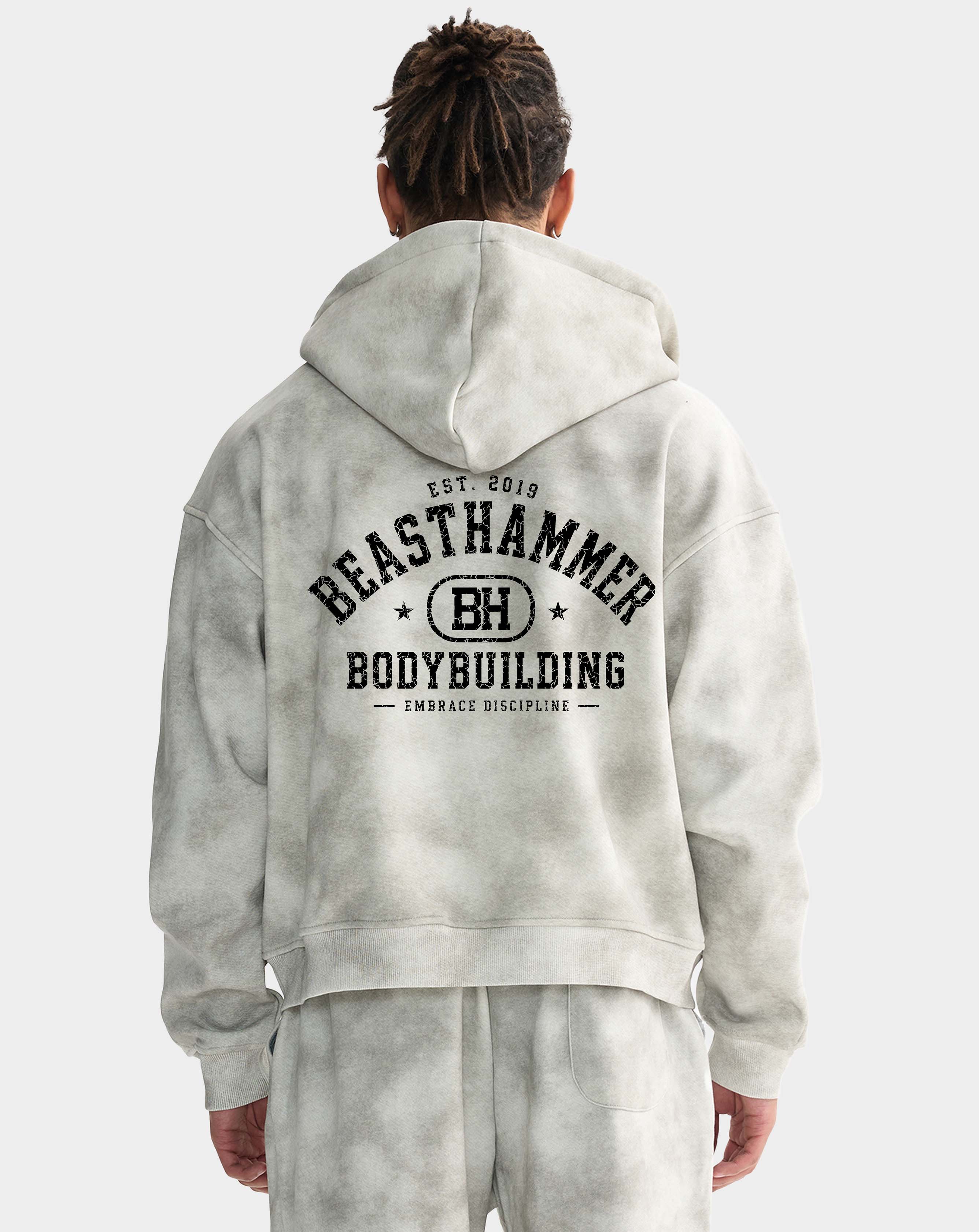 BEASTHAMMER Formed by Discipline zip hoodie in faded grey, worn back view
