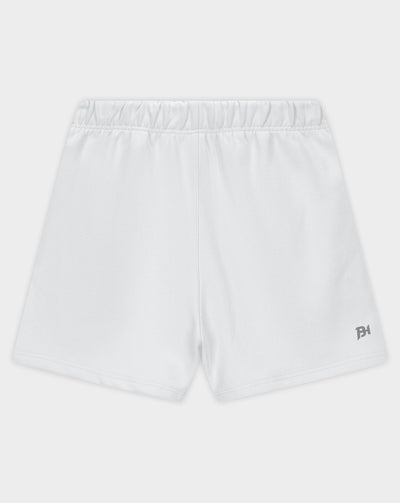 White athletic shorts with an elastic waistband and a small dark gray logo on the lower left hem, shown against a light gray background.