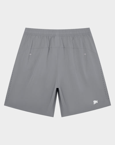 Black sweat shorts with a white graphic print on the lower right leg, featuring a drawstring waist and side pockets, shown against a light gray background.