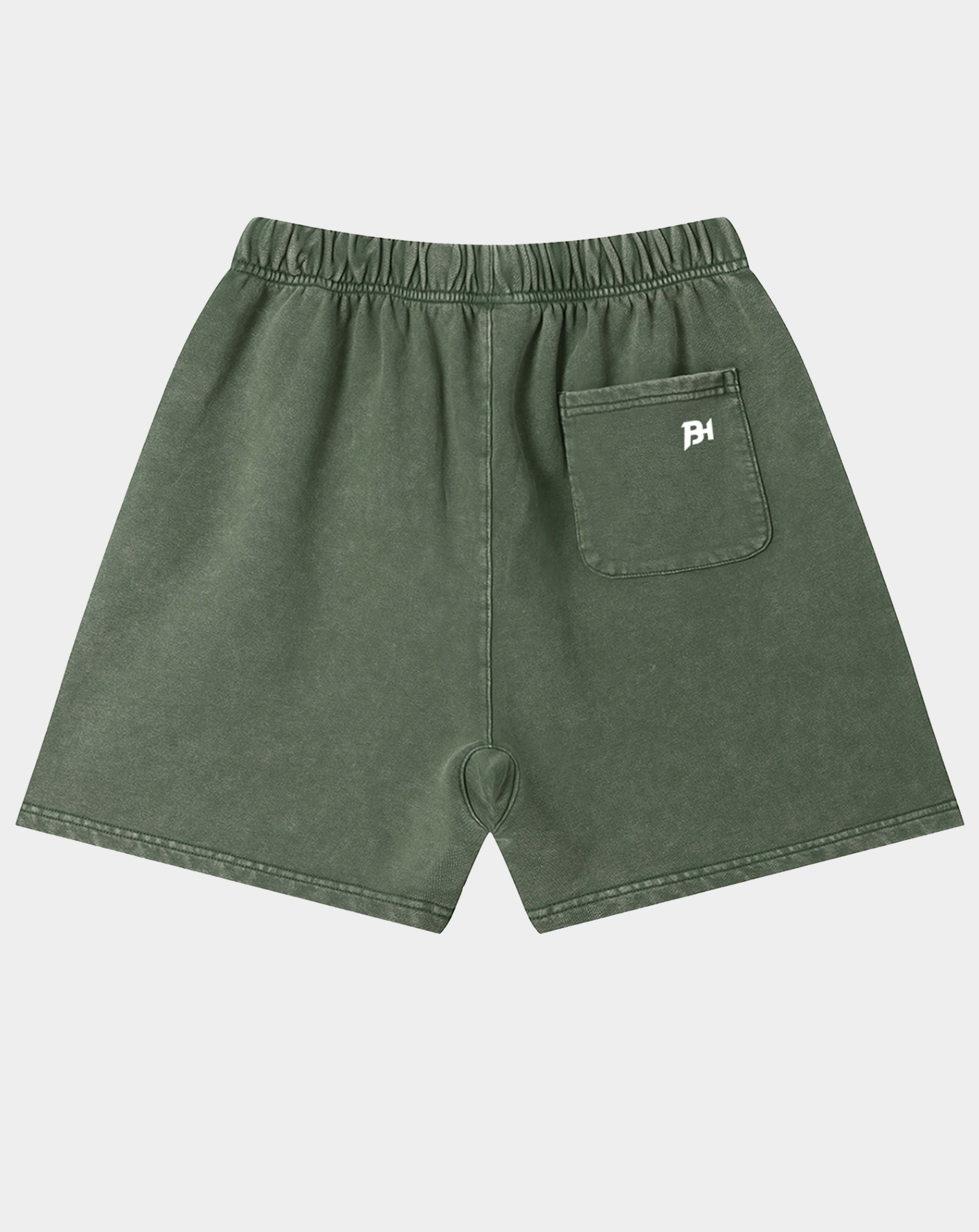 Olive green denim shorts with an elastic waistband, a side pocket, and a small white embroidered 'BH' logo on the pocket, shown against a light gray background.