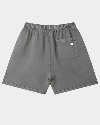 Gray washed denim shorts with an elastic waistband and a back pocket featuring a small white embroidered logo, shown against a light gray background.