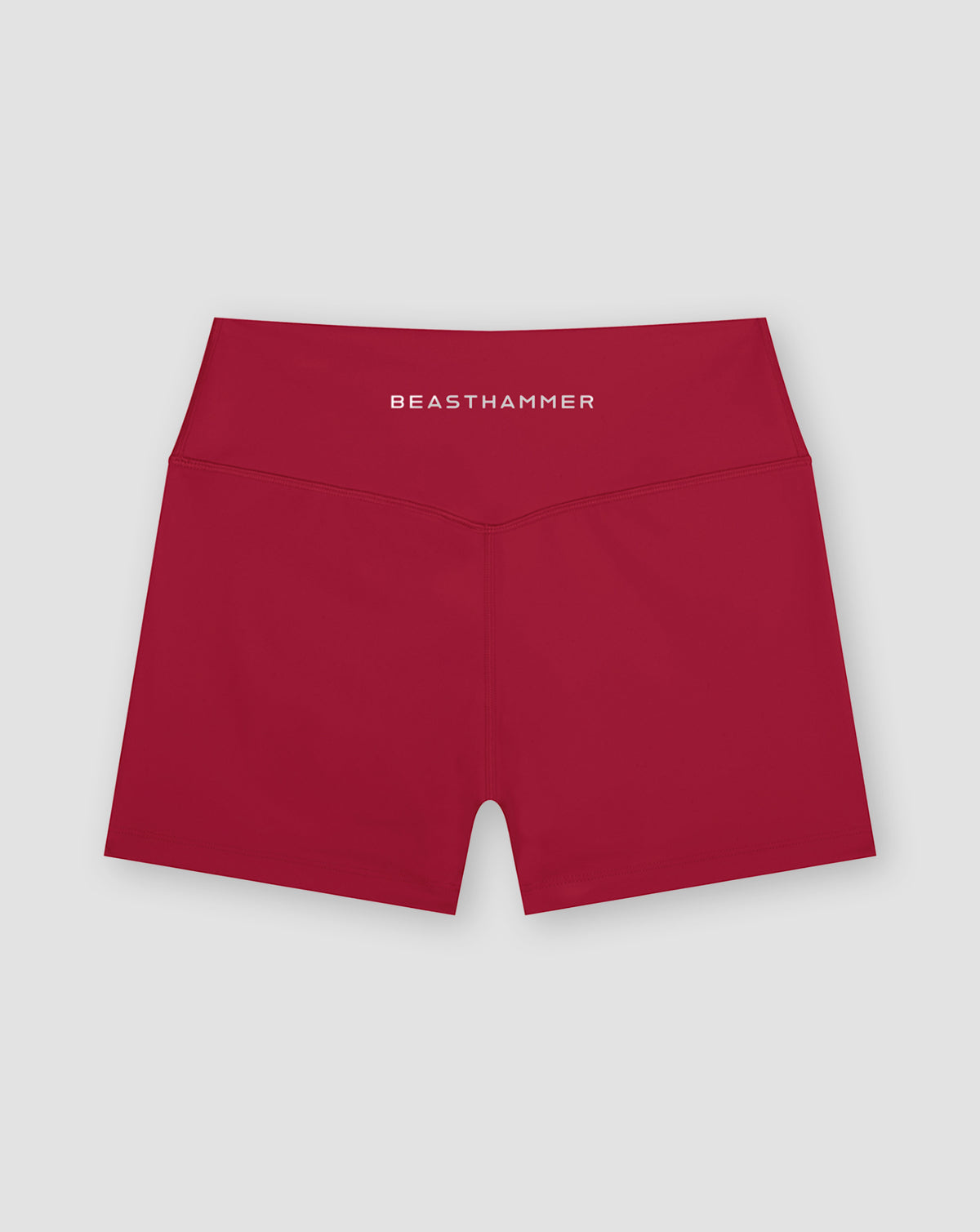 BEASTHAMMER Form high rise shorts in red, worn front view