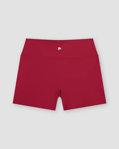 BEASTHAMMER Form high rise shorts in red, worn front view